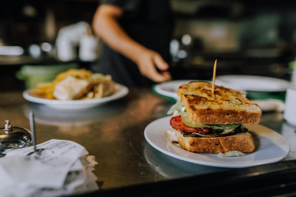 toasted bread sandwich at bar